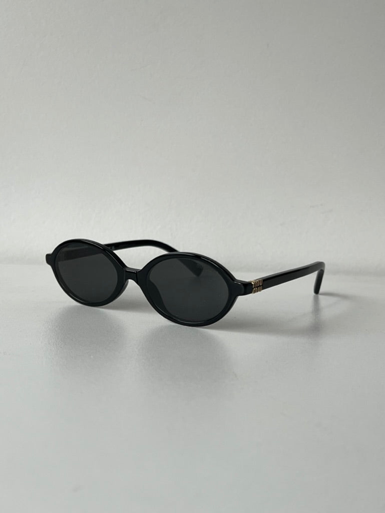 Miu Miu MU04ZSF Black Gold Oval Sunglasses