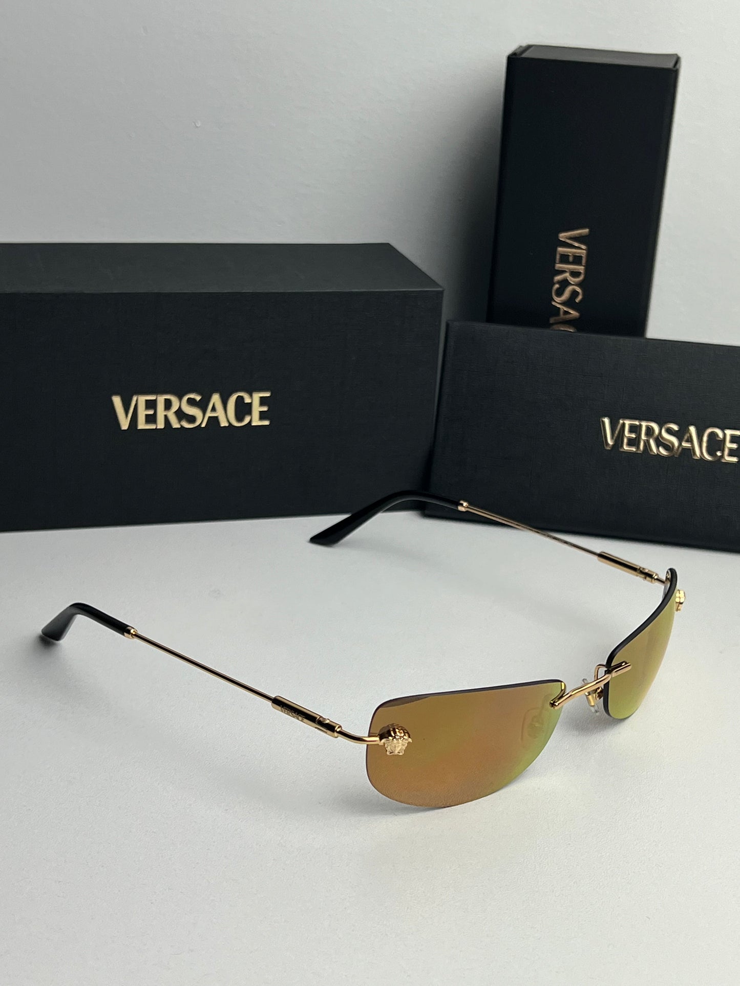 Versace VE2279 Rimless Sunglasses in Gold Mirror