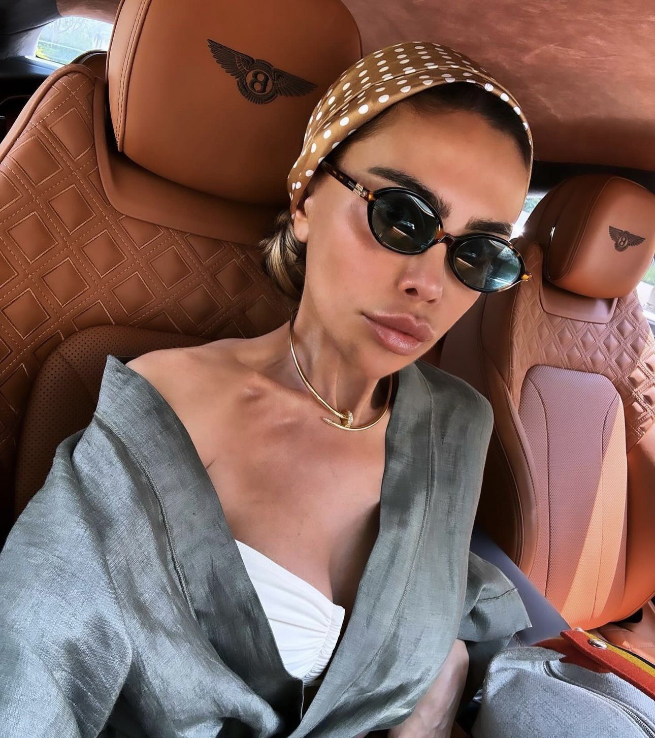 Miu Miu MU04ZSF Black Gold Oval Sunglasses