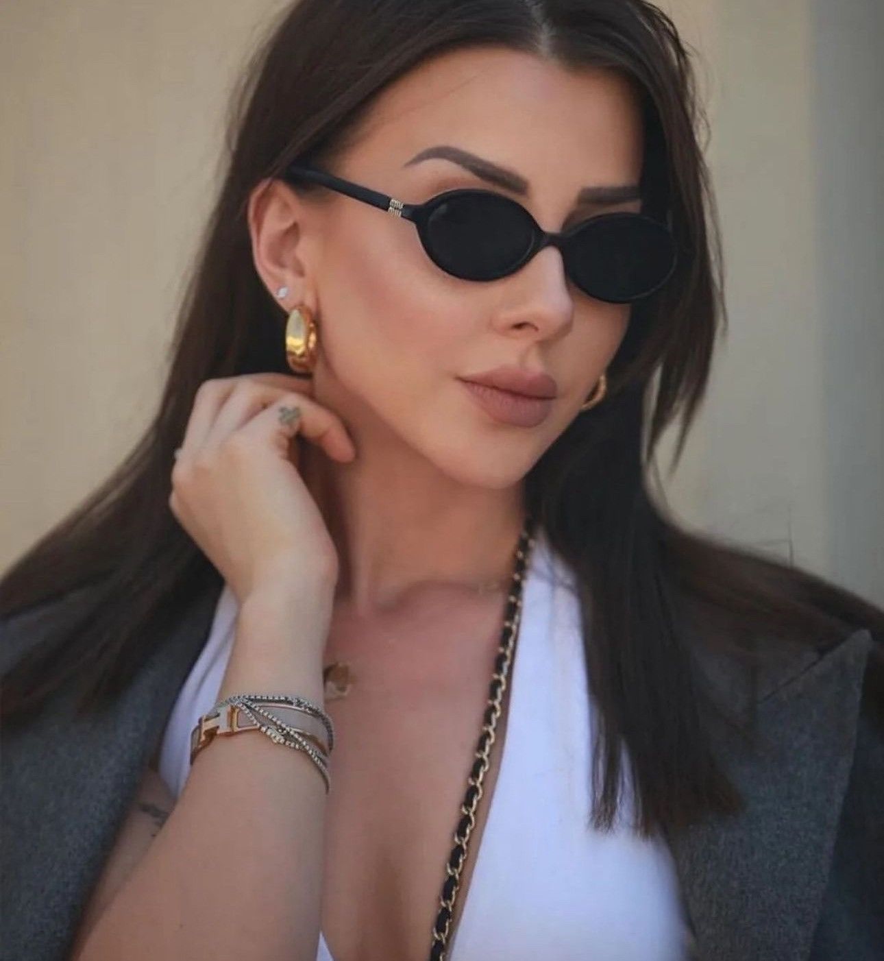 Miu Miu MU04ZSF Black Gold Oval Sunglasses