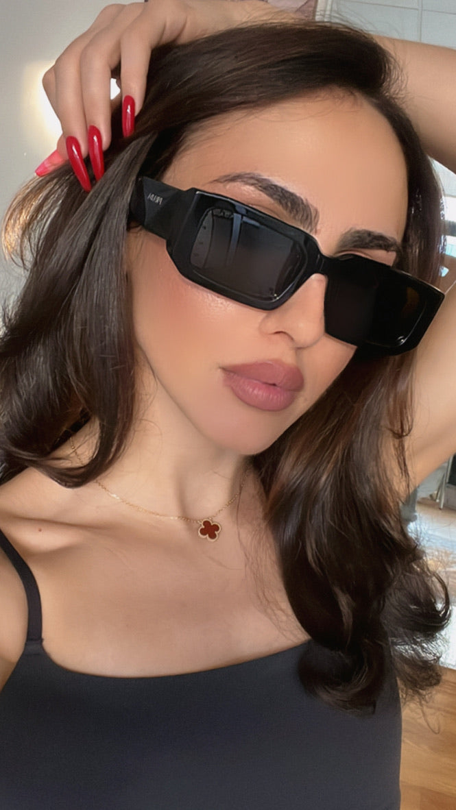 Prada PR06YS Sunglasses in Black Grey