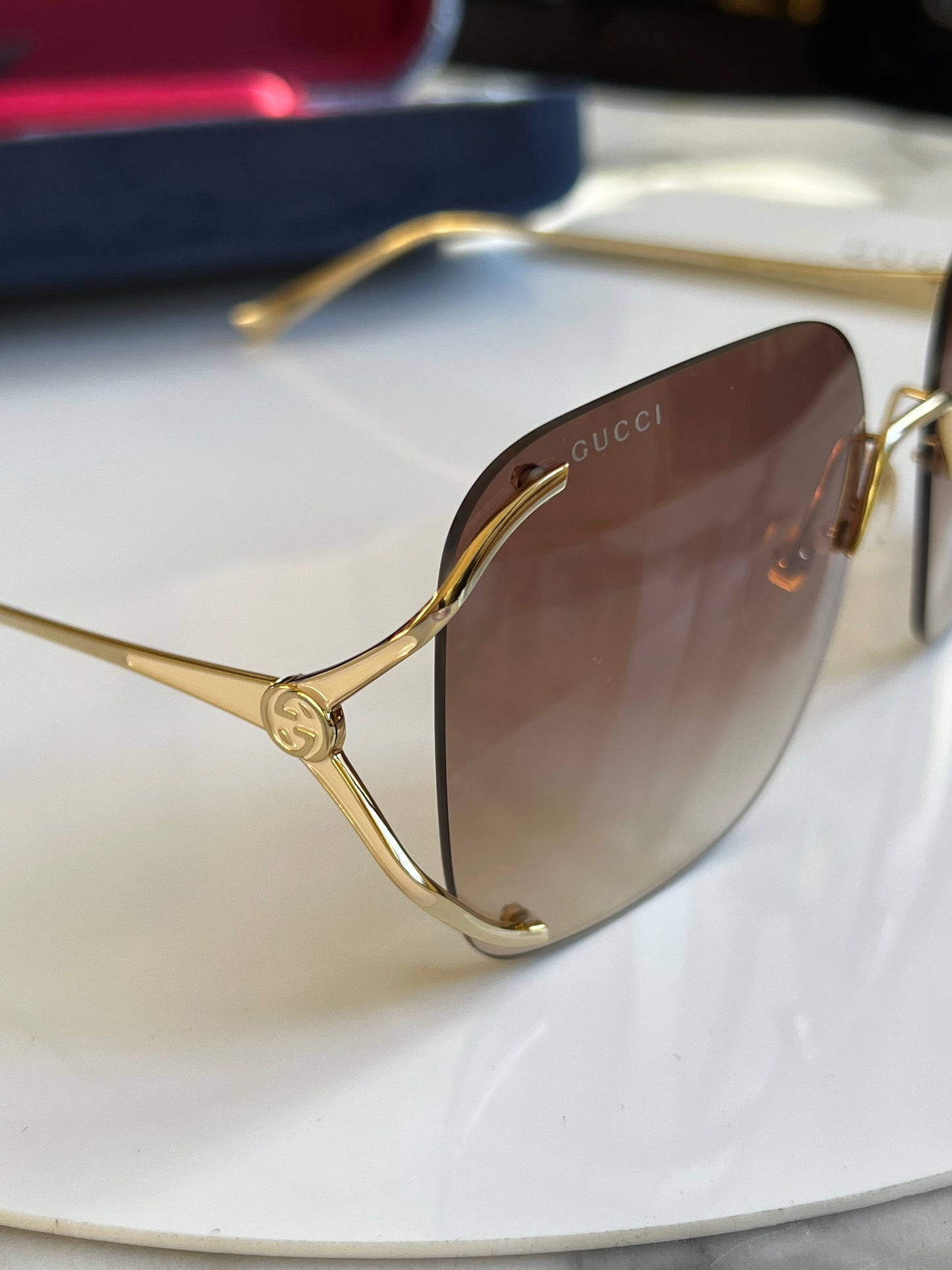 Gucci GG0646S Rimless Oversized Sunglasses in Brown Lens