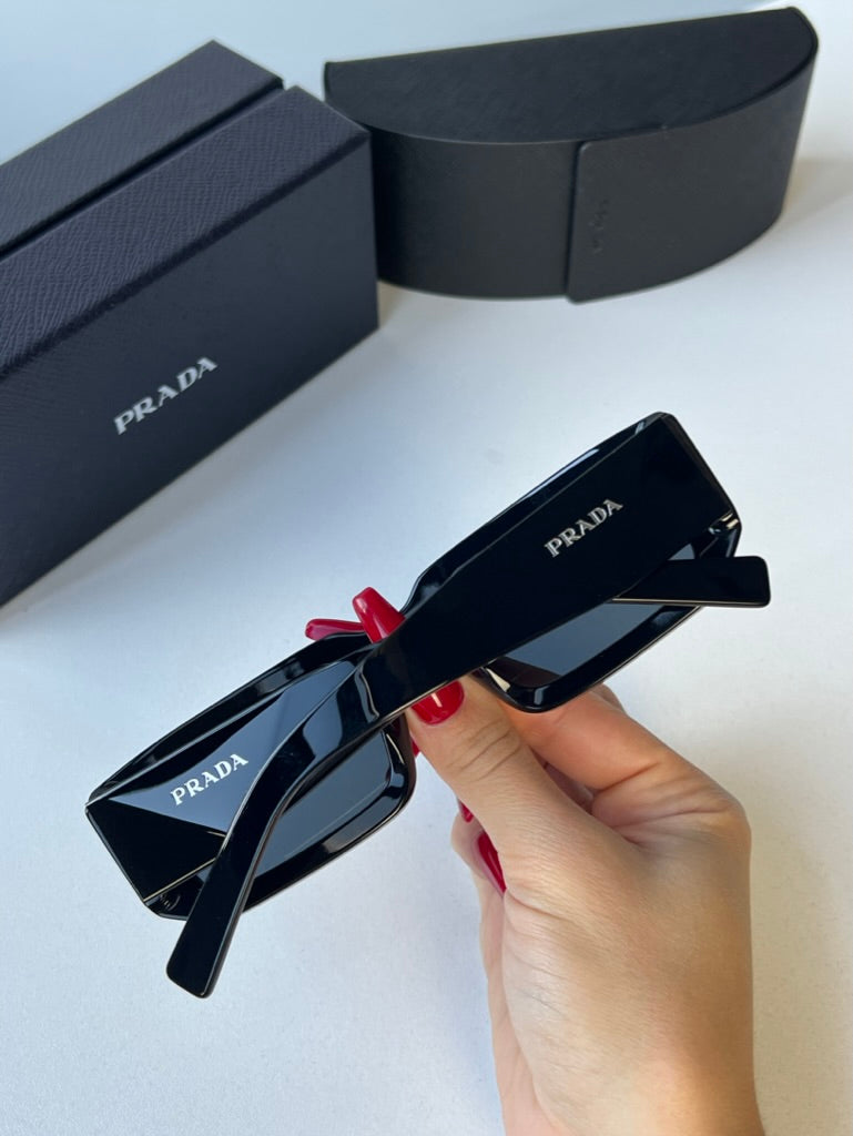 Prada PR06YS Sunglasses in Black Grey