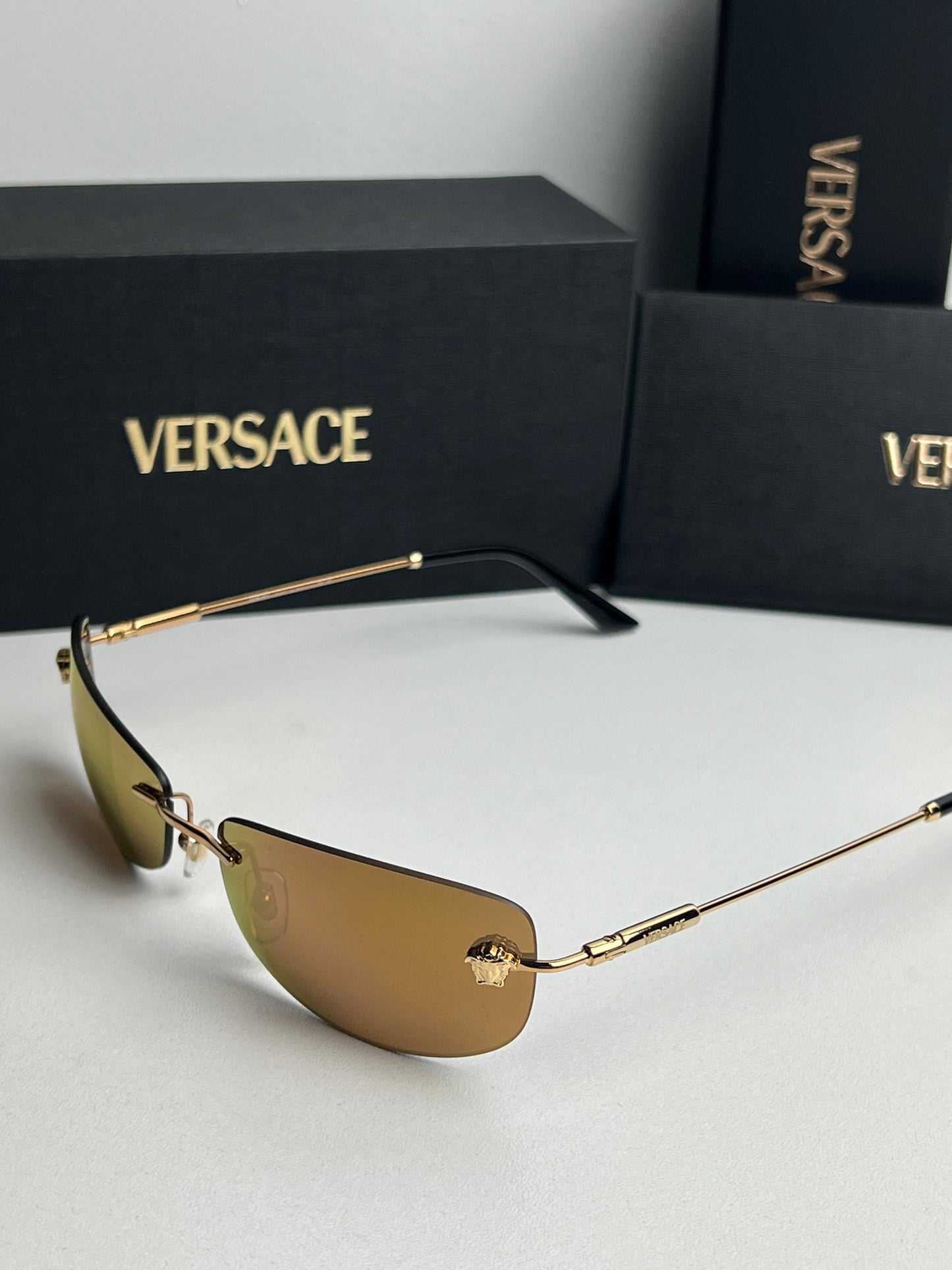 Versace VE2279 Rimless Sunglasses in Gold Mirror