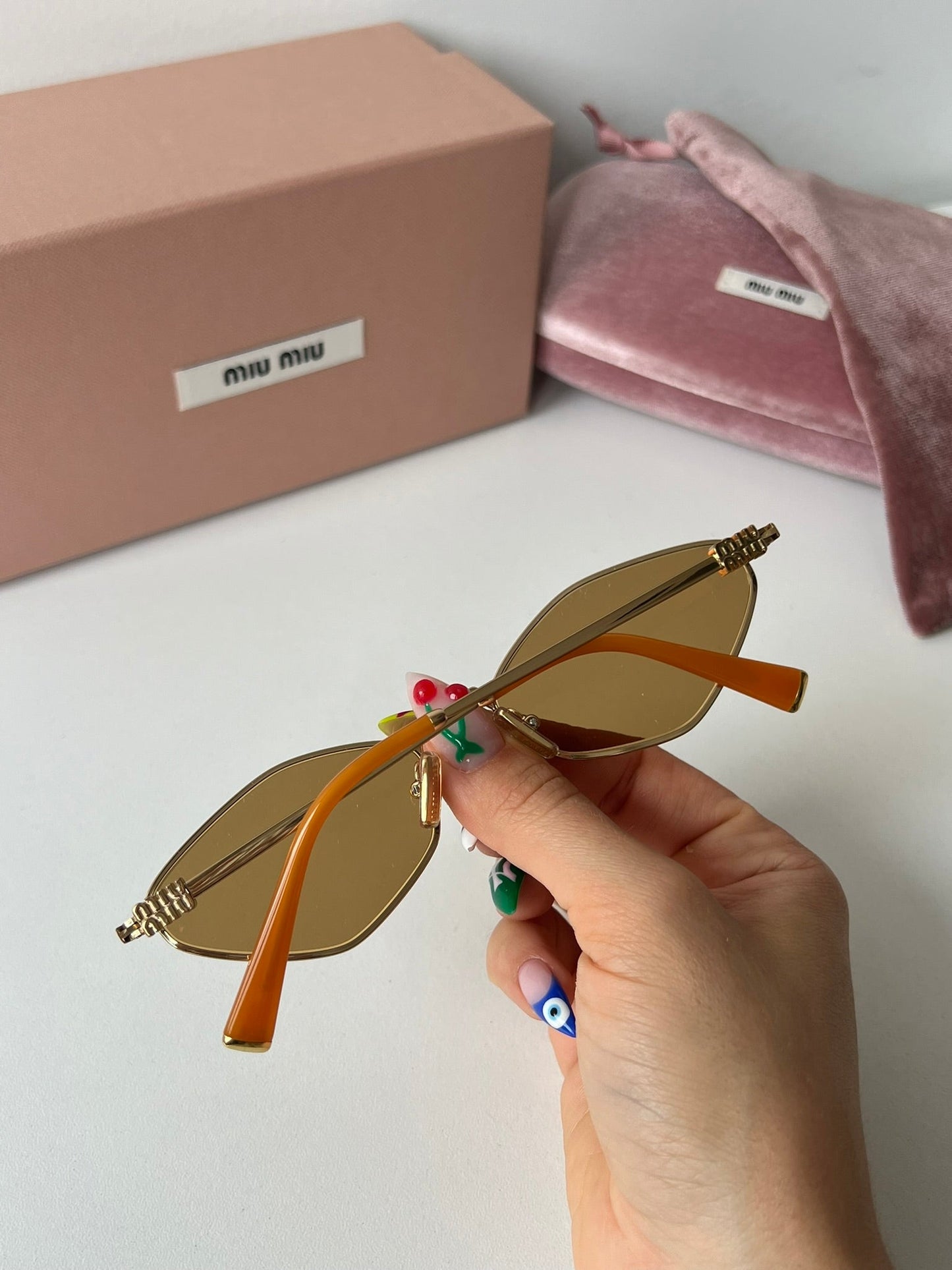 Miu Miu MU56ZS Sunglasses in Gold Mirror