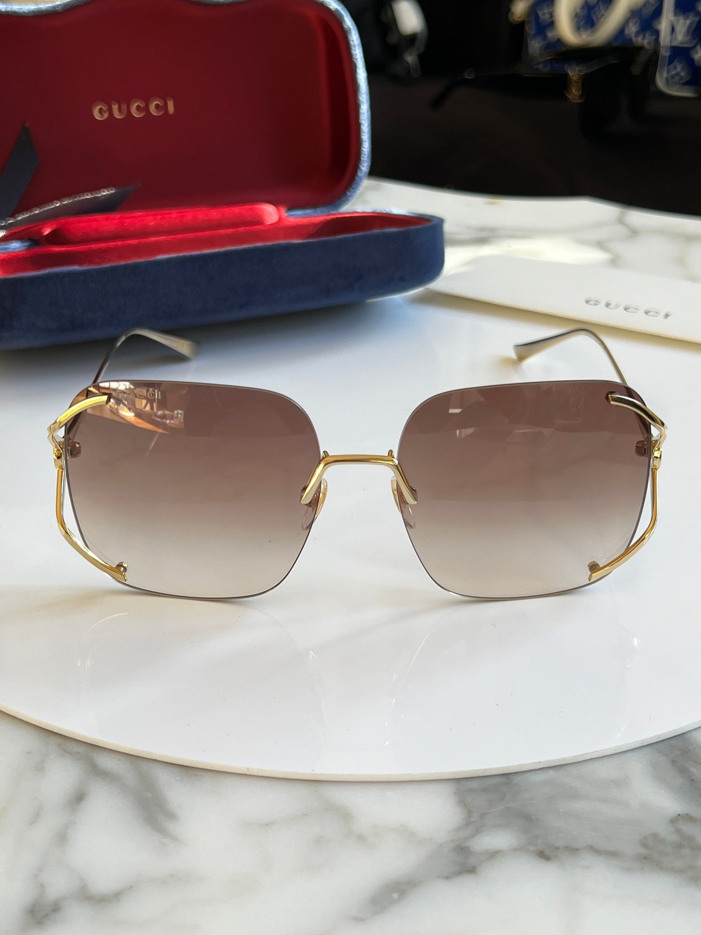 Gucci GG0646S Rimless Oversized Sunglasses in Brown Lens