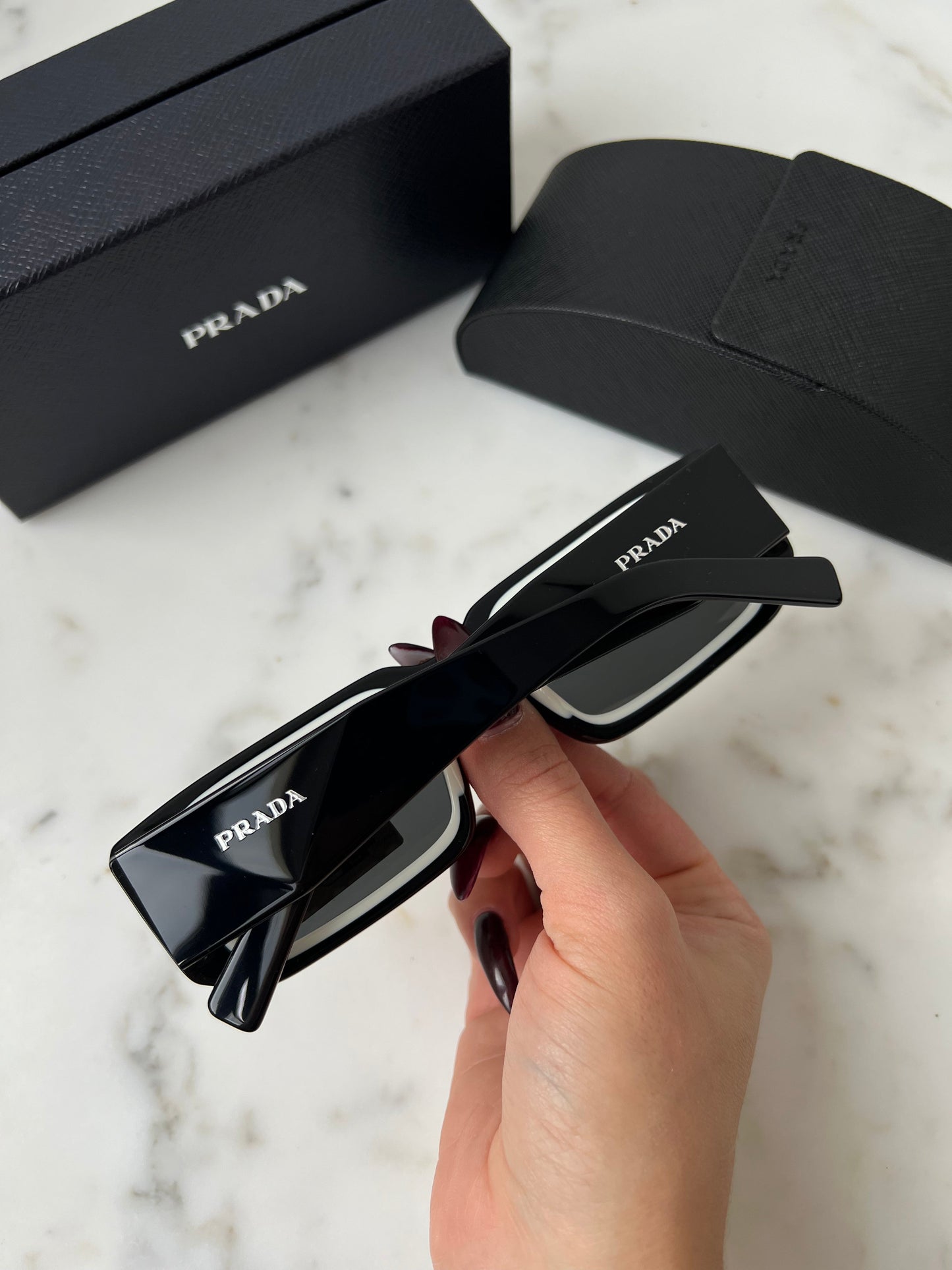 Prada PR06YS Sunglasses in Black