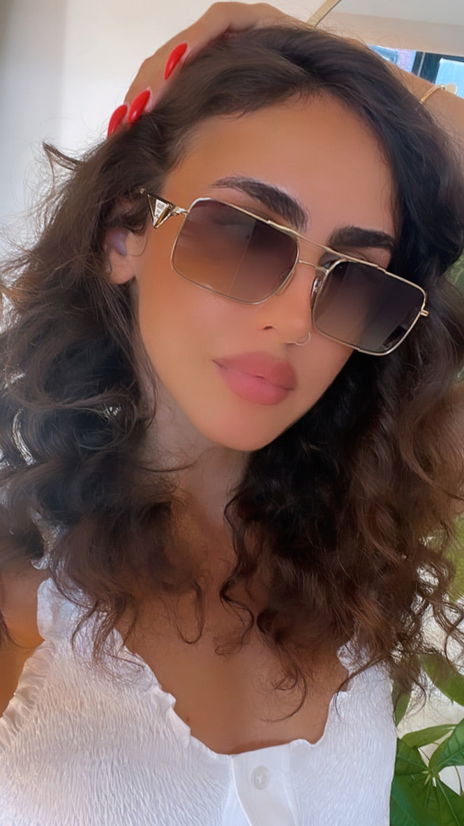 Prada PR A52S Sunglasses in Gold Grey