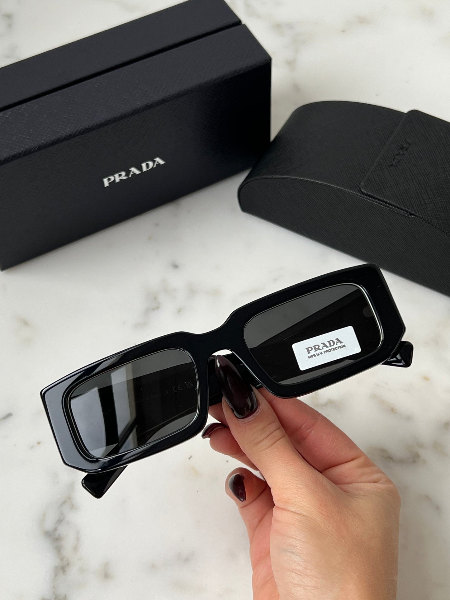 Prada PR06YS Sunglasses in Black