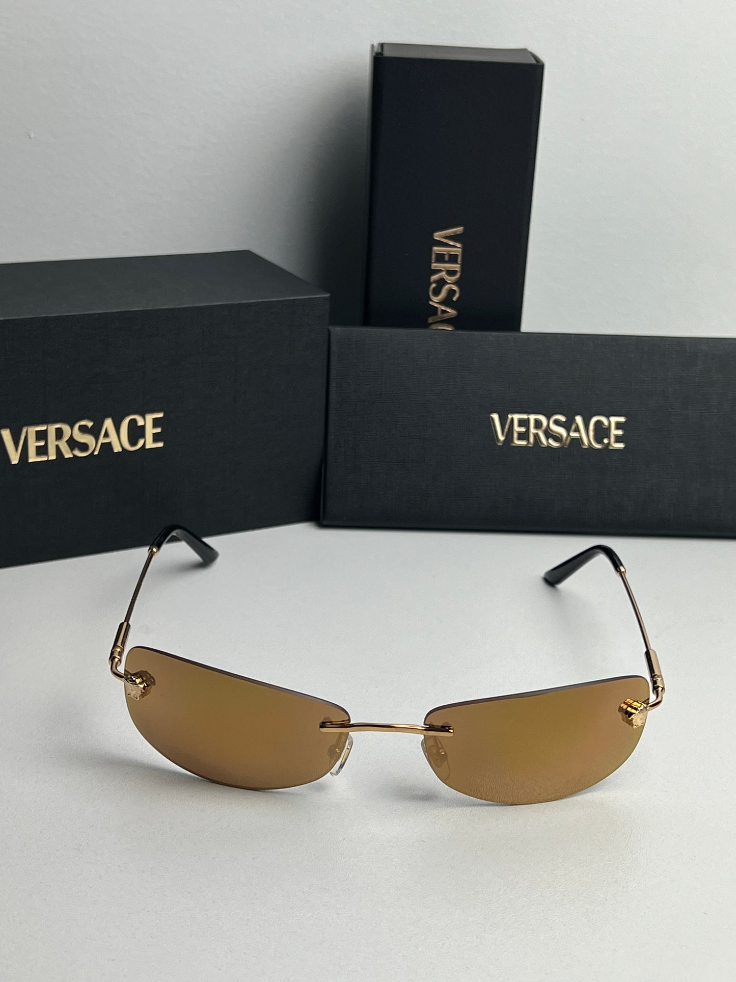 Versace VE2279 Rimless Sunglasses in Gold Mirror