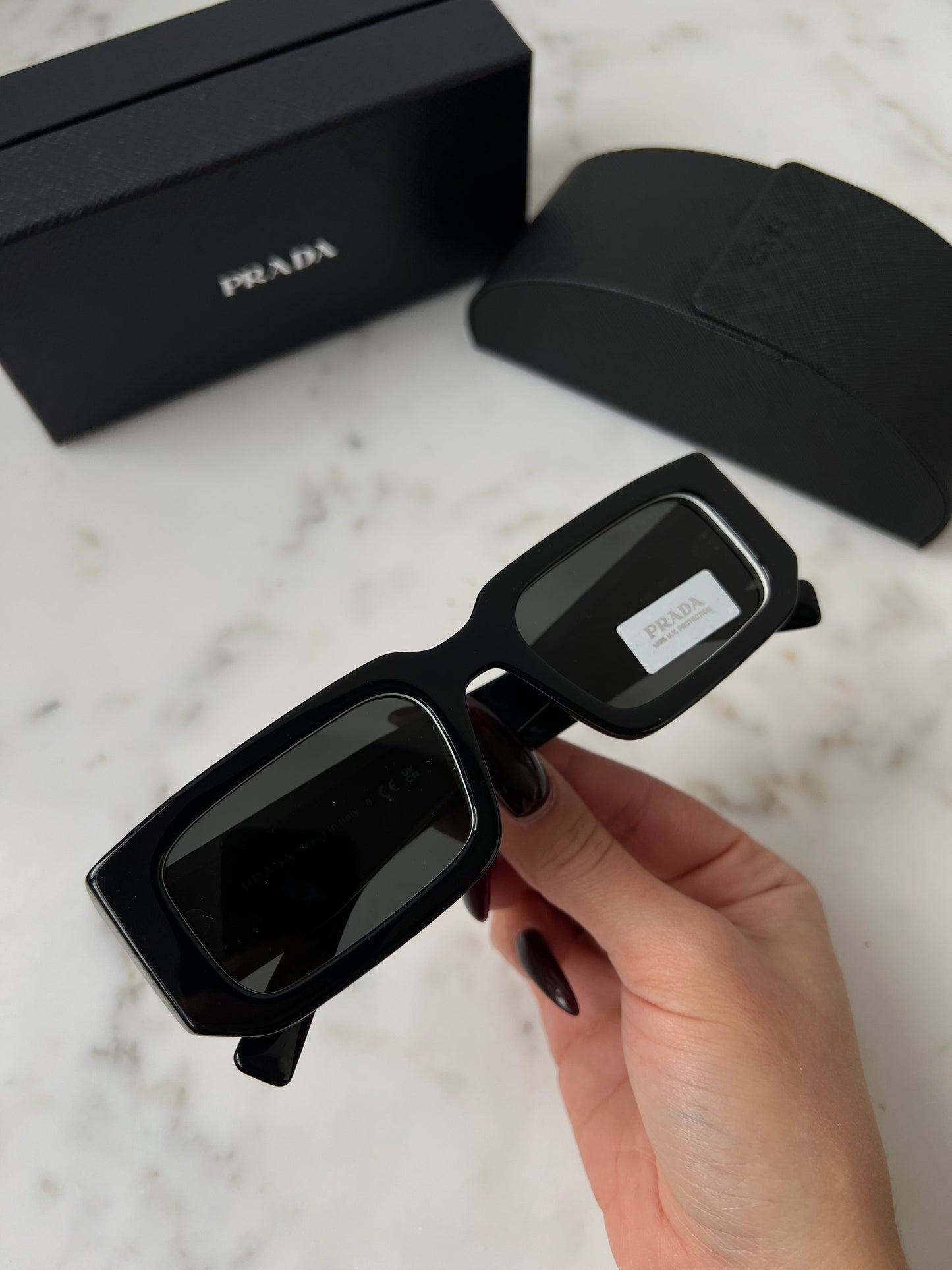 Prada PR06YS Sunglasses in Black